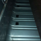 Some expert mechanic drilled holes in the trunk floor. We suspect it was for a trailer hitch...